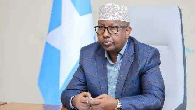 Golaha Ammaanka QM ee shaaca ka qaaday xiriirka ka dhexeeya Wasiir Axmed Macallin Fiqi, Wasiirka cusub e Gaashaandhigga Soomaaliya, iyo argagixisada AS?